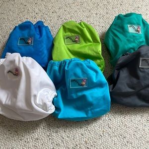 Washed but never used newborn cloth diaper covers